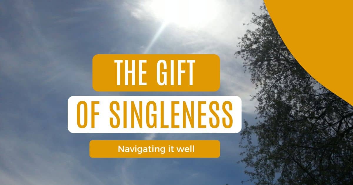 View of the beach on a semi cloudy day with the gift of singleness: navigating it well written on top