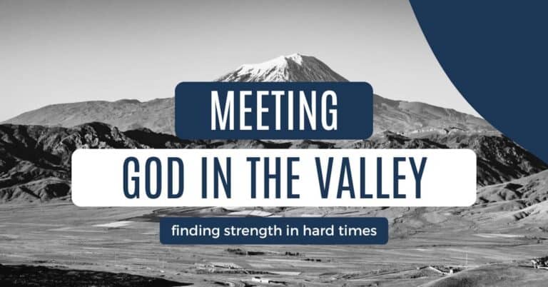 black and white photo of the mountains with Meeting God in the valley written on it.